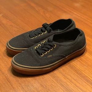 Black Vans sneakers